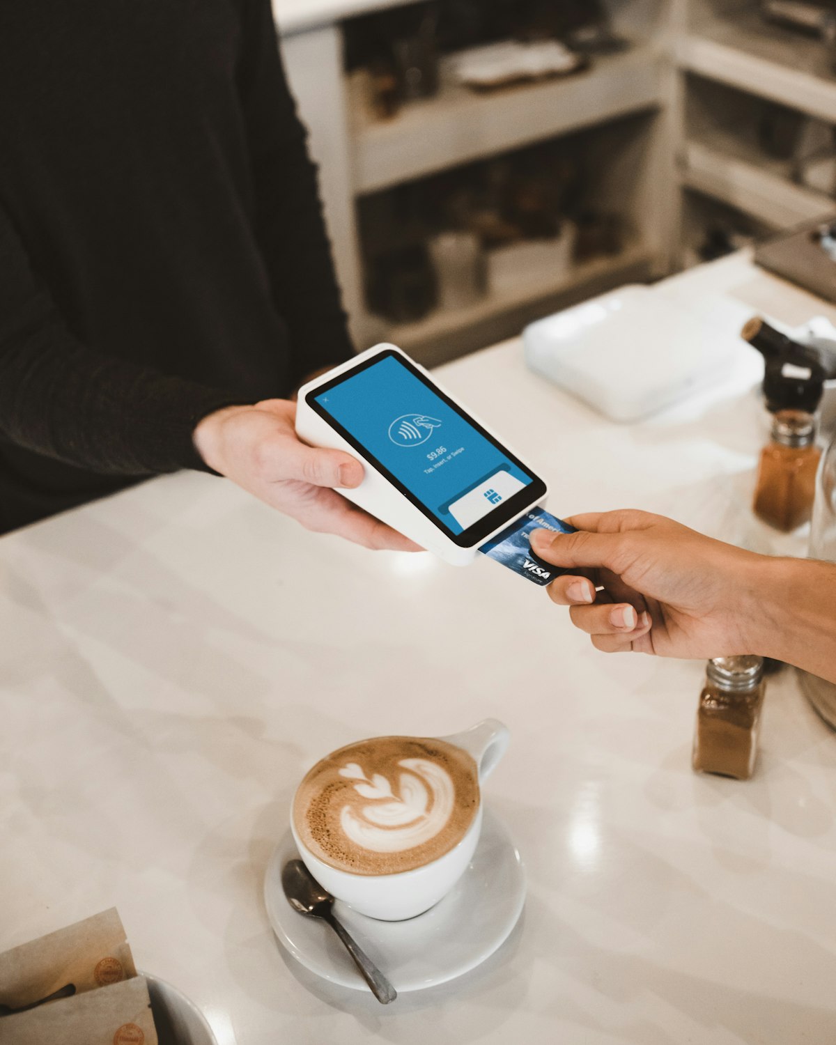 Card payment being processed through a payment terminal
