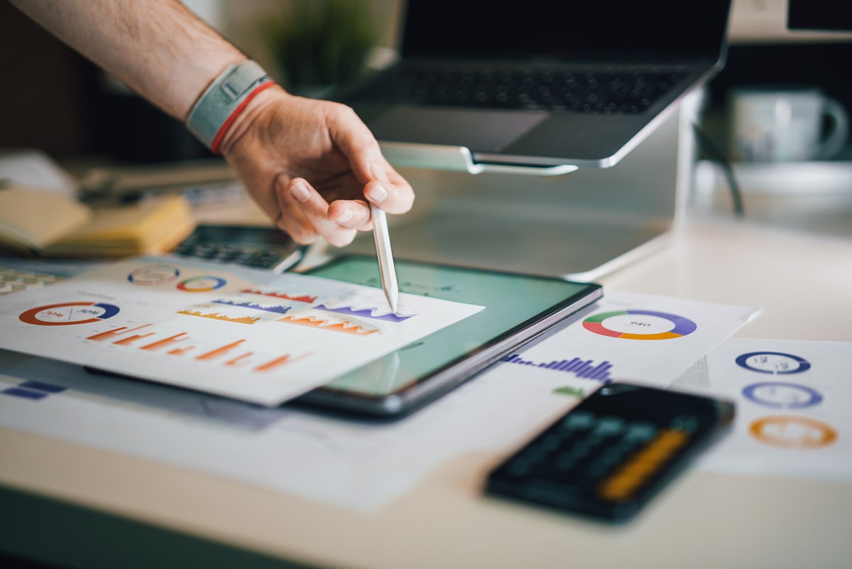 Analyst reviewing operational charts with a stylus